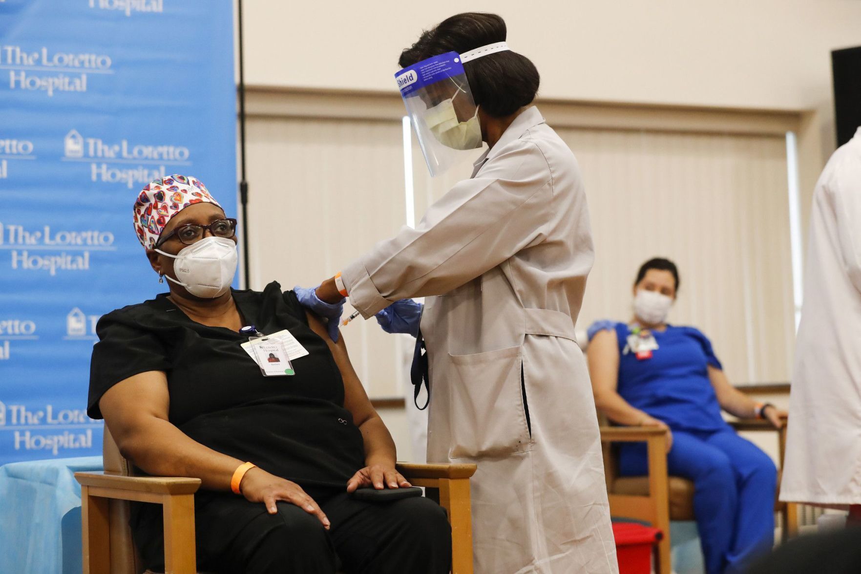 US-NEWS-ILLINOIS-STARTS-ADMINISTERING-COVID-19-VACCINE-6-TB.jpg